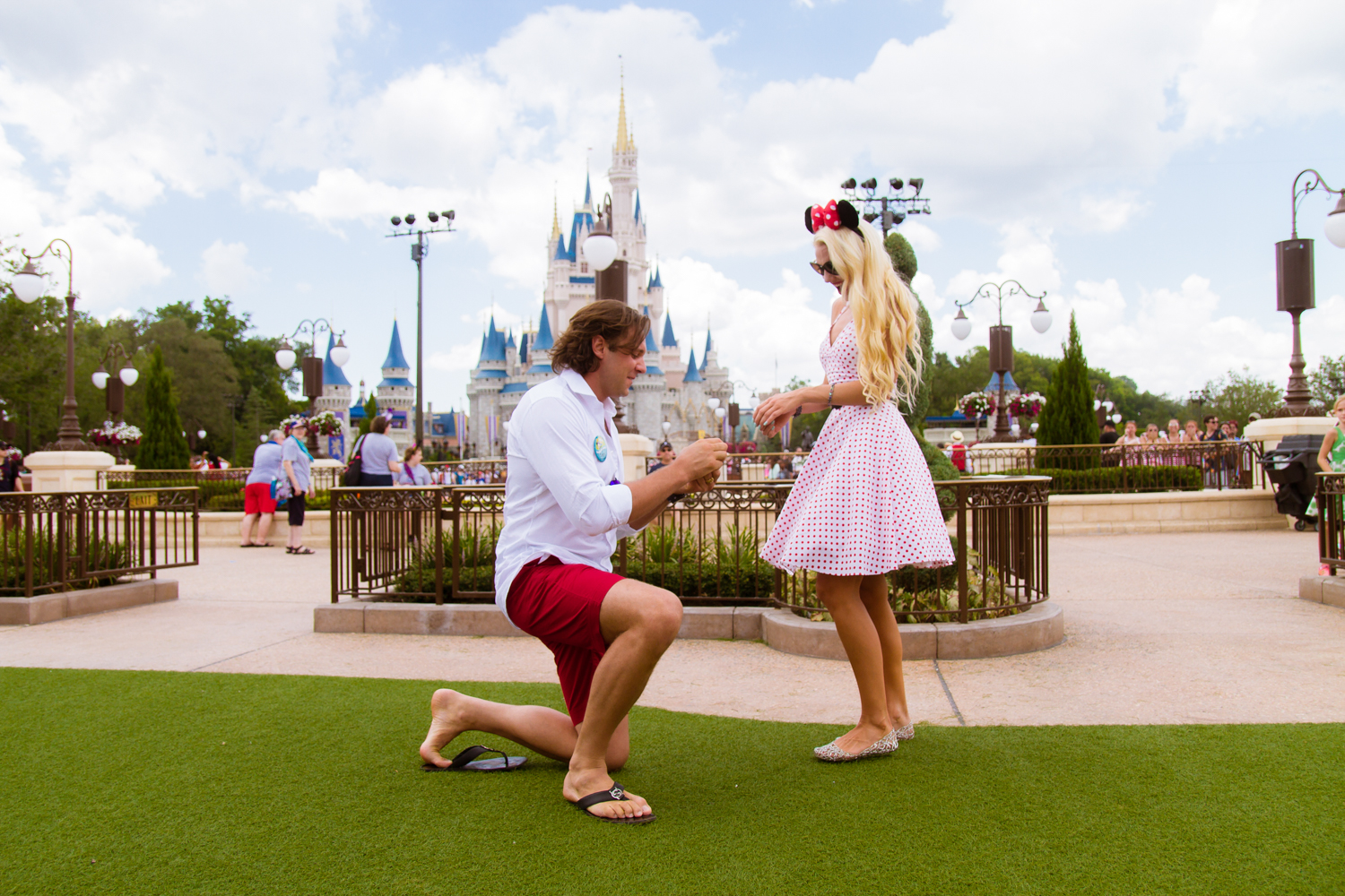 Disney Magic Kingdom Marriage Proposal done by Orlando Wedding Photographer Albert Ha...