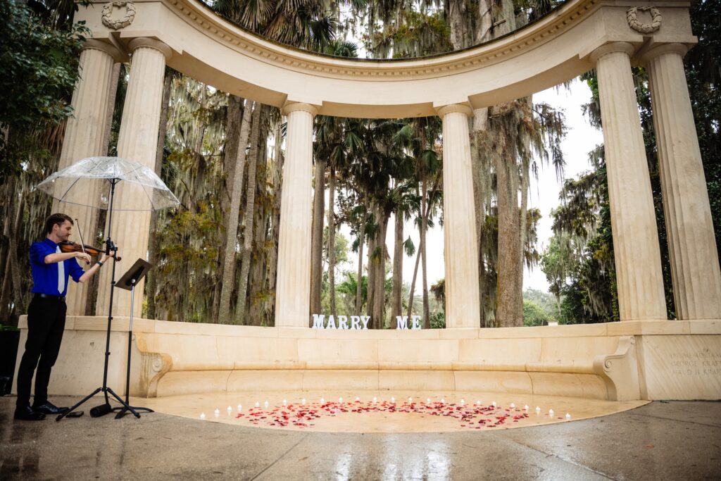Small Marry Me Sign Flowers Candles Orlando Proposal Packages Violinist
